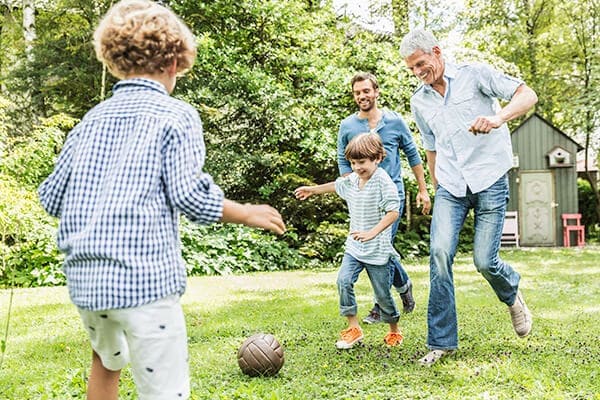 Granddad playing with his grandkids